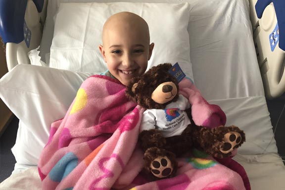patient with golden teddy bear