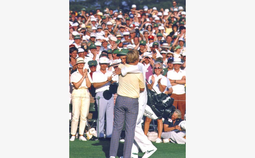 Jack and Jack Nicklaus Jr. hug at the 1986 Masters